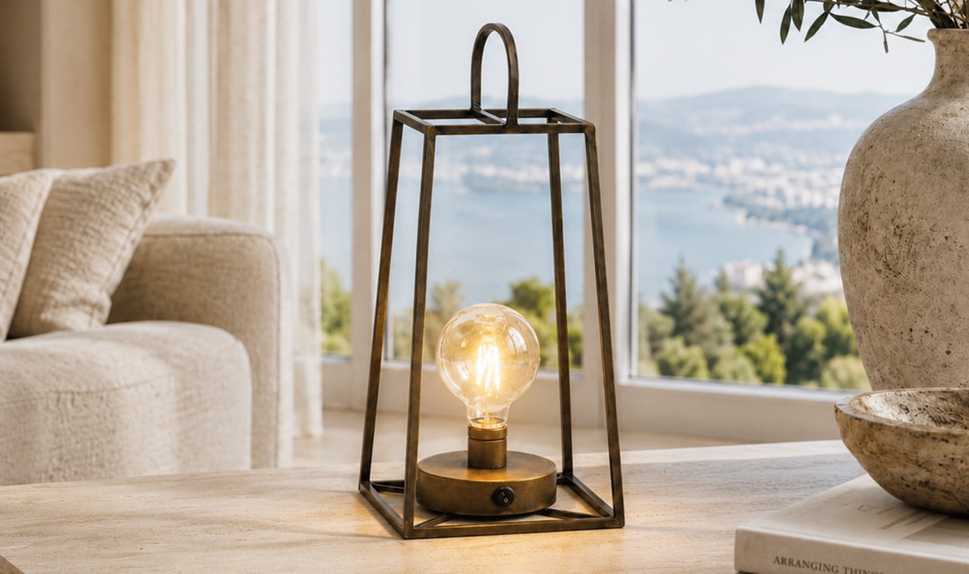 Sculptural lighting piece placed on a wooden dining table.